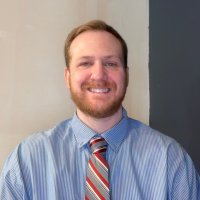Portrait of Nick Thomas. 